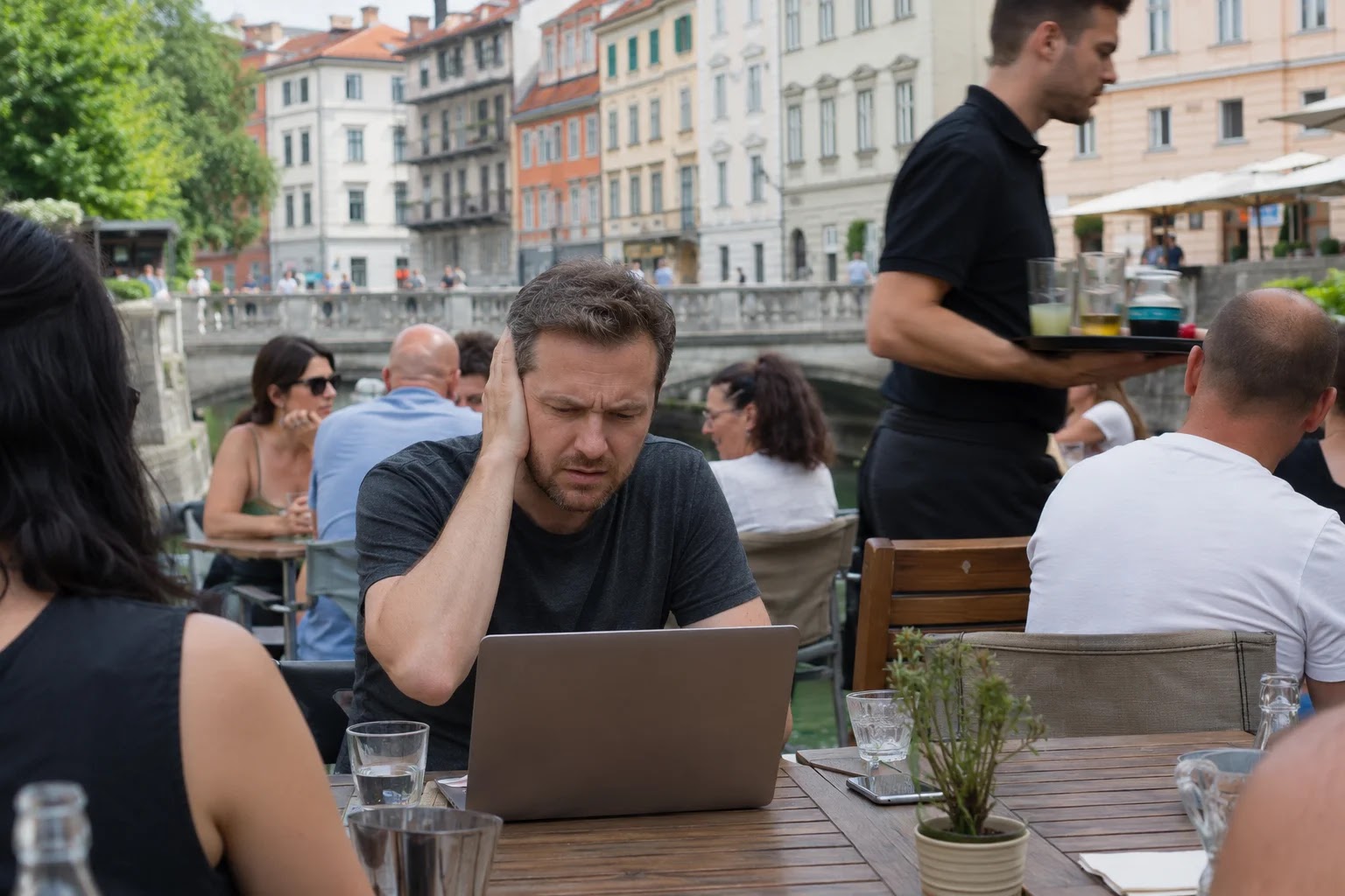 A noisy café meeting in Ljubljana with people struggling to concentrate