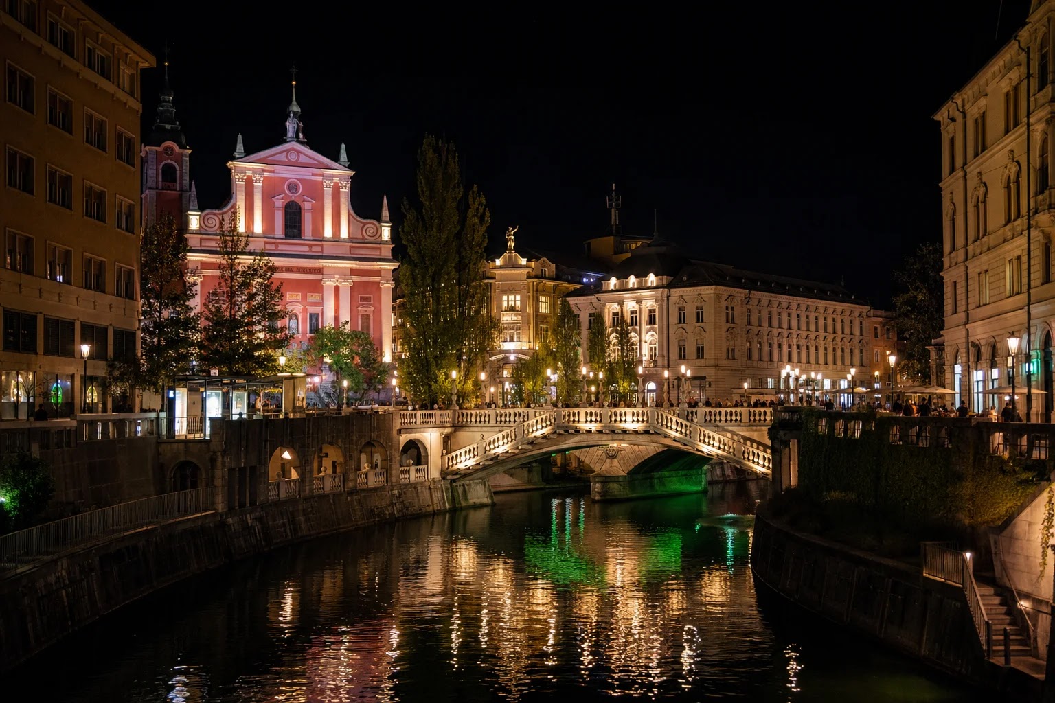 Triple Bridge in Ljubljana late at night, lit and quiet