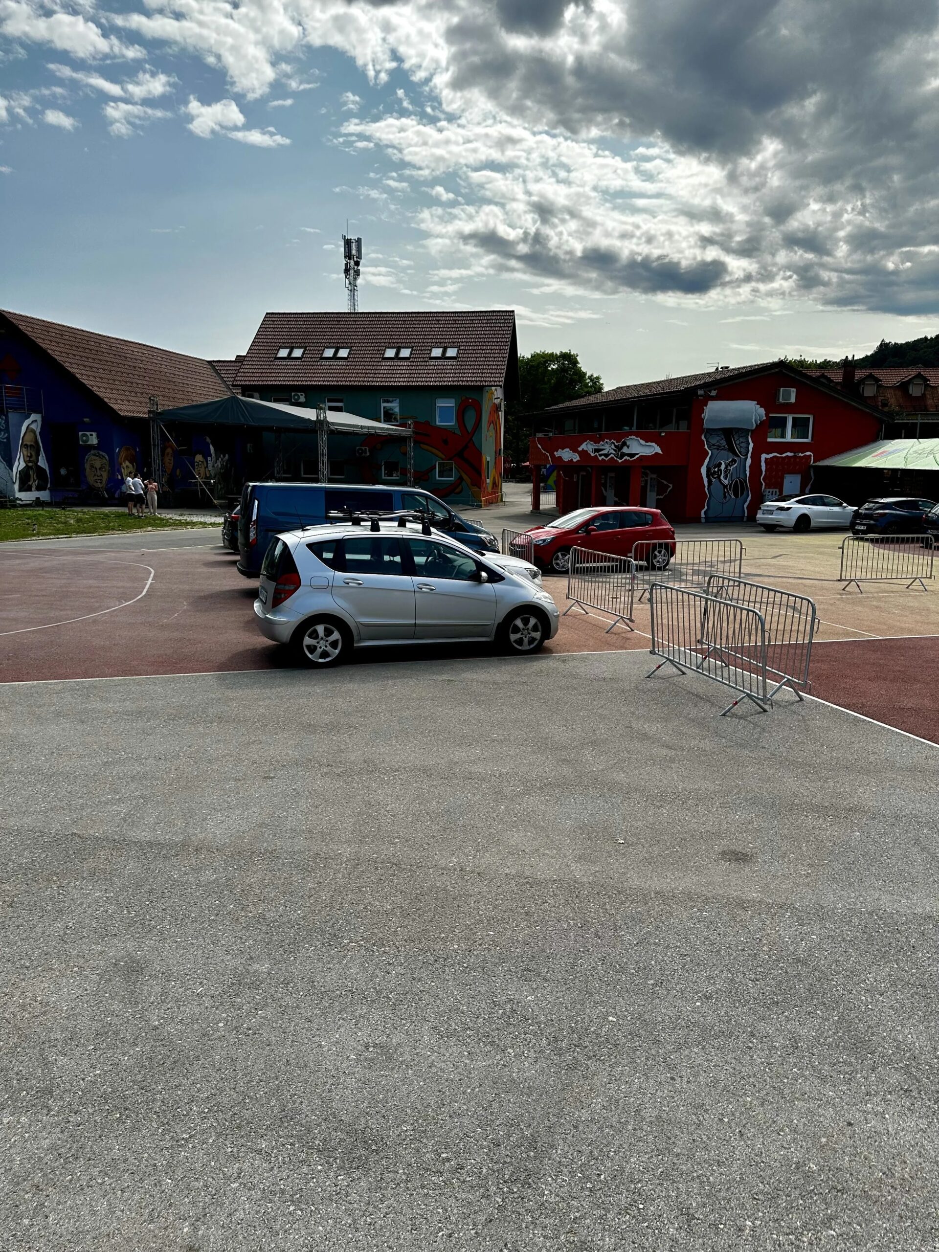 Building exterior and parking area of makerSP_CE coworking